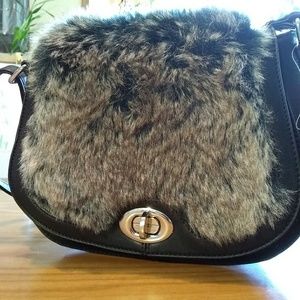 Black Rivet genuine leather handbag foe fur